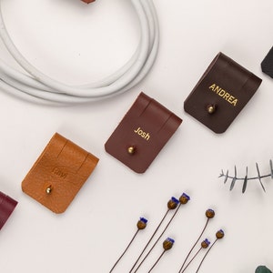Leather Cable Holders displayed on a white background showing available colors.
