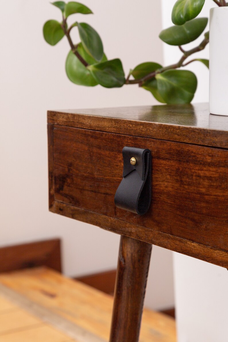 Closeup of a Small Wide Pull installed on a bedside table.