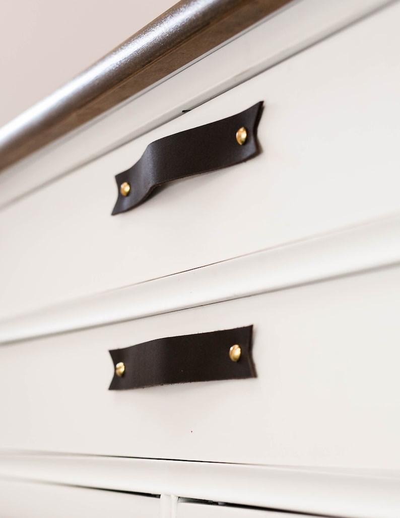 Leather Handles installed on a white dresser.