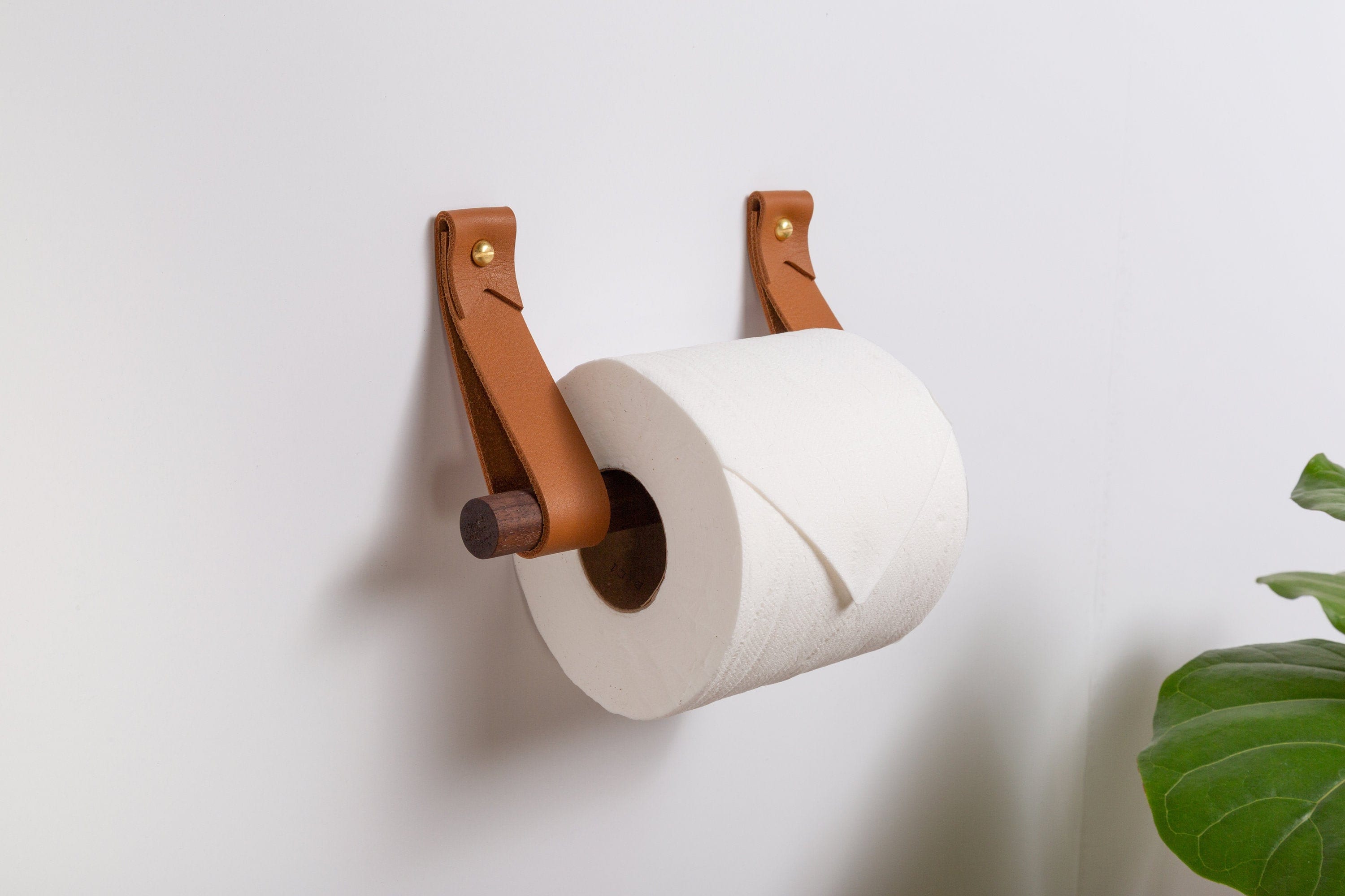 Aquatica Rio Self Adhesive Wall-Mounted Toilet Paper Roll Holder