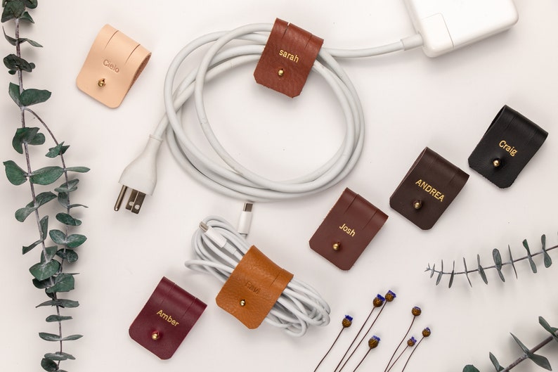 Leather Cable Holders displayed on a white background showing available colors.