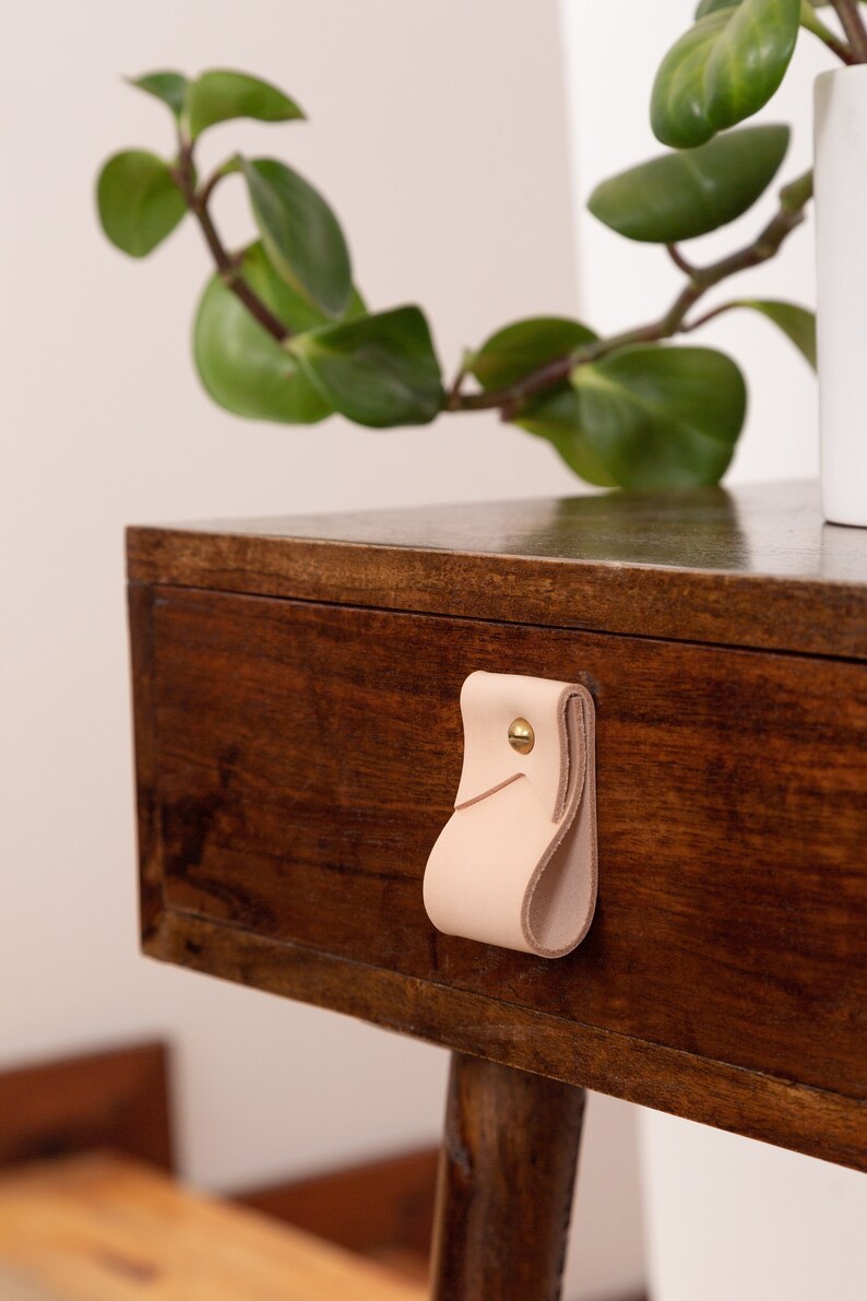 Closeup of a Small Wide Pull installed on a bedside table.