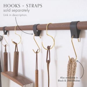 An image explaining that the metal hooks + straps you see in this photo are also available to purchase, see the link in the description.