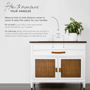 Keyaiira leather cabinet and drawer handle measurement guide showing how to measure existing furniture hardware holes for custom genuine leather pulls with V-shaped pointed ends and brass mounting hardware