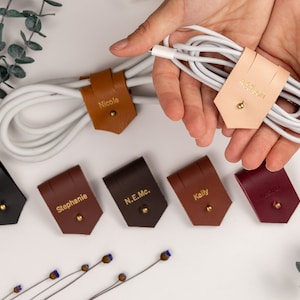 Leather Cable Holders displayed on a white background