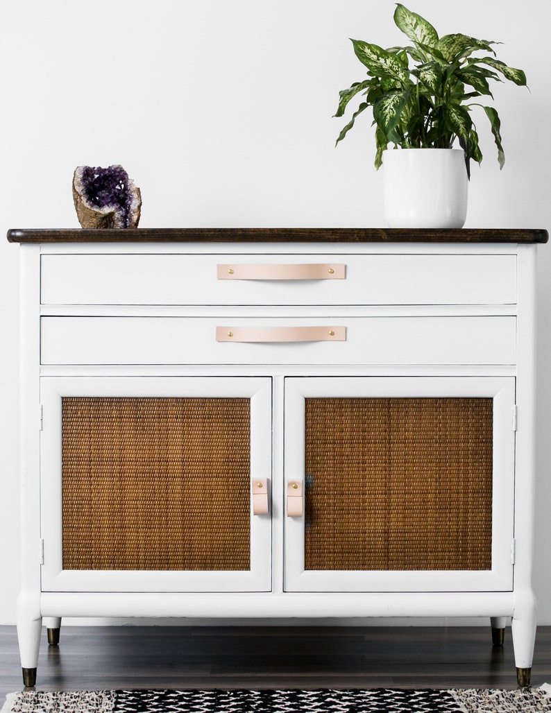 Leather Handles installed on a white dresser.