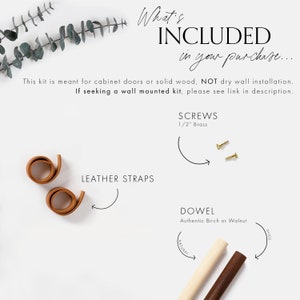 Guide showing the hardware that is included labeled with arrows pointing to the components on a white background. 
Mini screws lays flat alongside two leather straps and a dowel in your choice of Birch or Walnut wood.