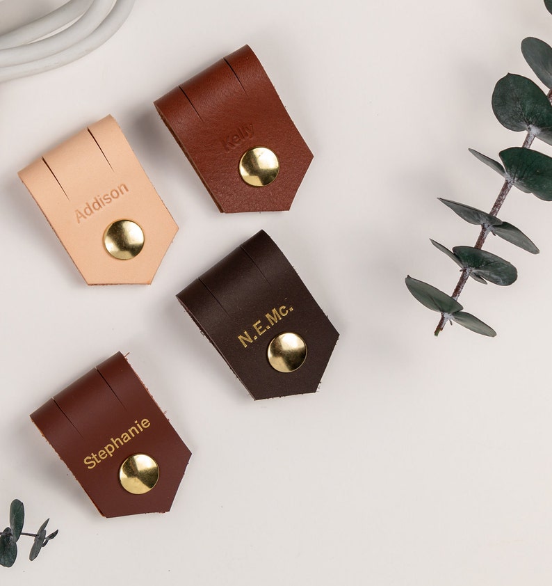 Leather Cable Holders displayed on a white background showing available colors.