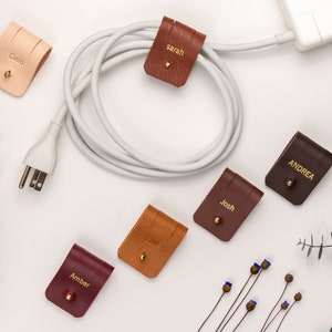 Leather Cable Holders displayed on a white background showing available colors.