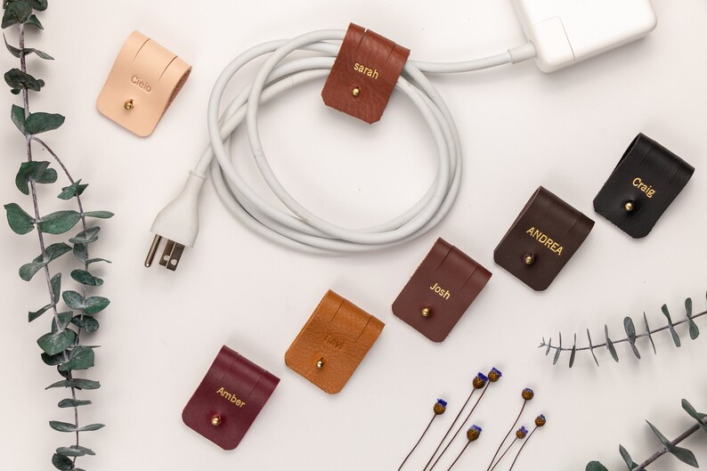 Leather Cable Holders displayed on a white background showing available colors.