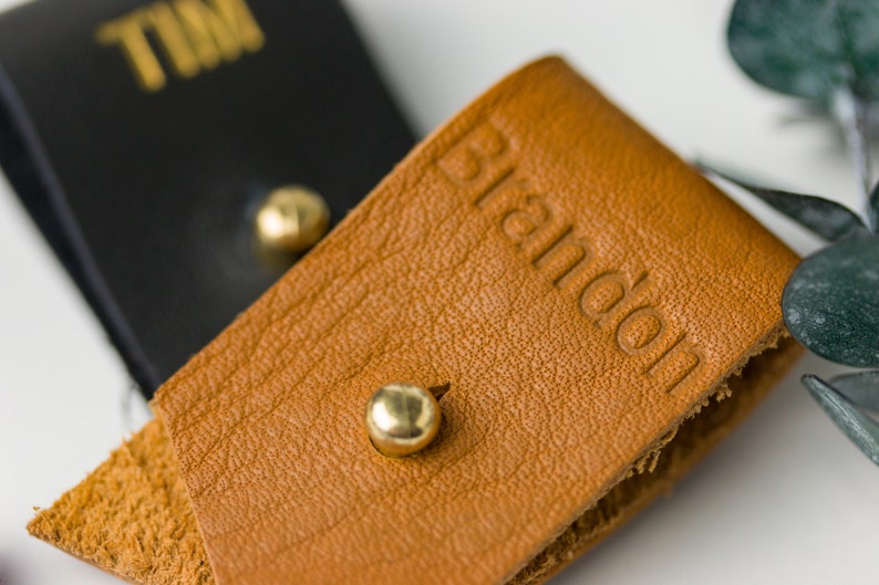 Closeup of Small Cord Holder with Imprinted lettering.