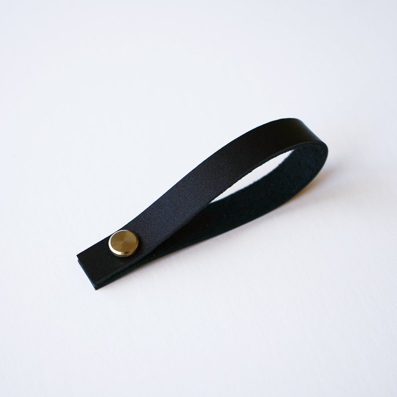 Black Sustainable Leather loop with brass Chicago screw closure, removable hanger for potholders, towels, oven mitts, trivets, keychains and more.