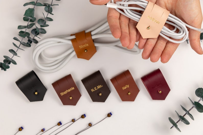 Leather Cable Holders displayed on a white background