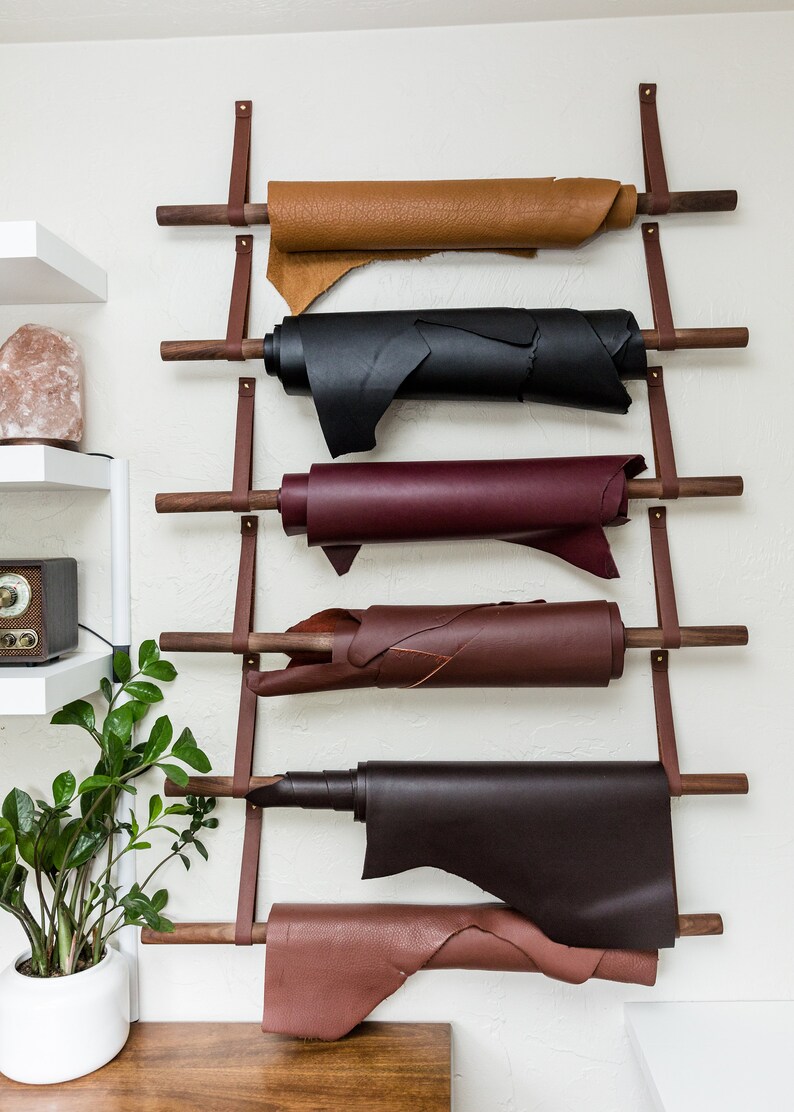 Large Wall Straps used with dowels to hang hides on a wall.