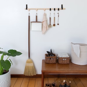 A Hanging Dowel Kit used to hang towels and other kitchen accessories from Metal Hooks & Leather Loops.