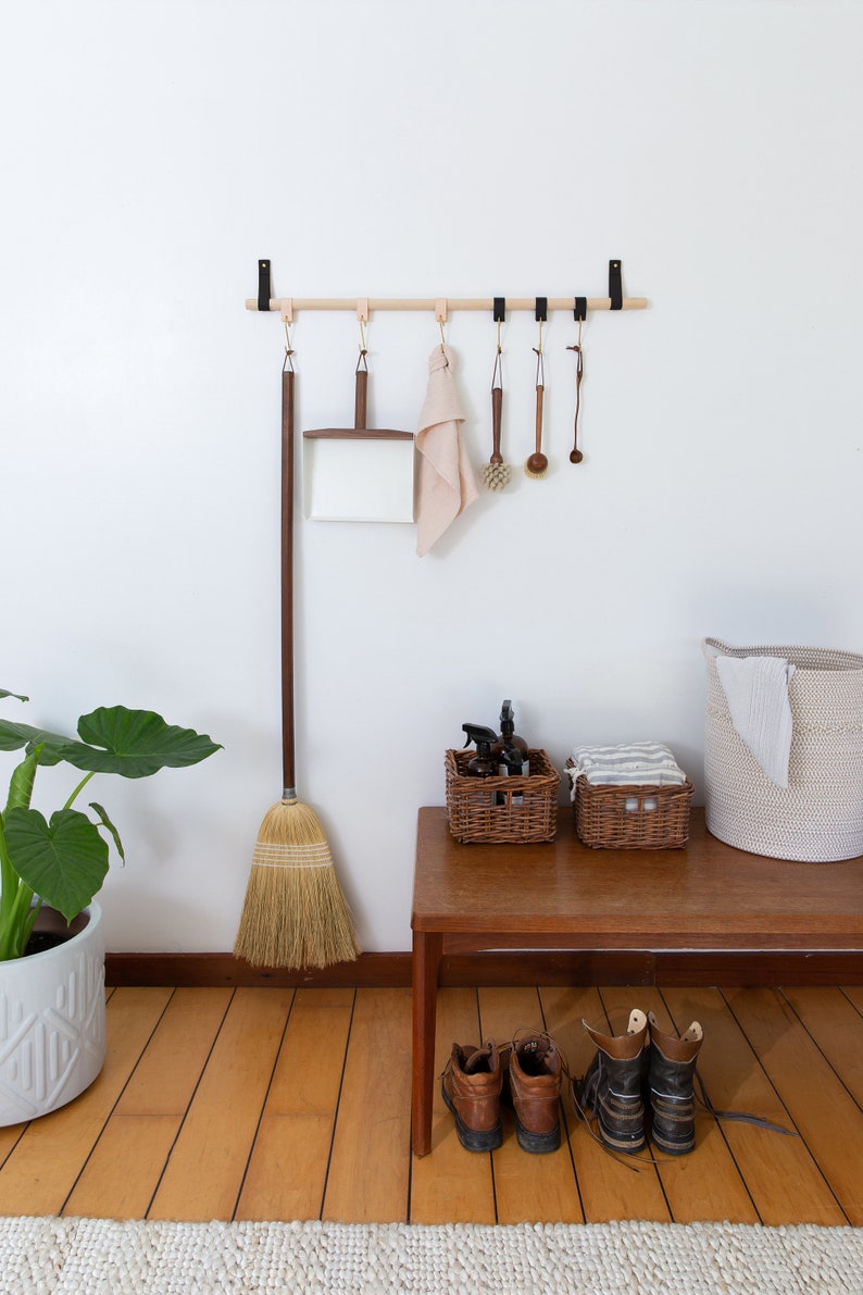 A Hanging Dowel Kit used to hang towels and other kitchen accessories from Metal Hooks & Leather Loops.