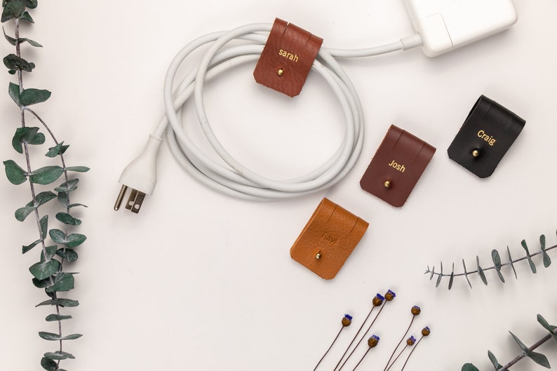 Leather Cable Holders displayed on a white background showing available colors.