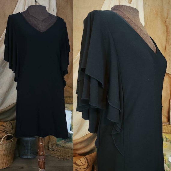Badgley Mischka black dress with ruffled sleeves!