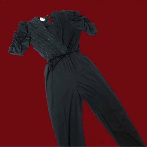 Vintage 1990s black jump suit with a wrap style to