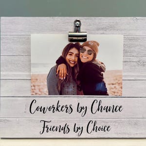 May include: A handmade, wooden cutting board with a natural wood grain finish. The board features a juice groove and a handle for easy carrying. Dimensions are approximately 18 inches long, 12 inches wide, and 1 inch thick.
