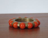 Vintage 1930s brass Fisher Jewel Tray with reddish marbles. Pat.99857