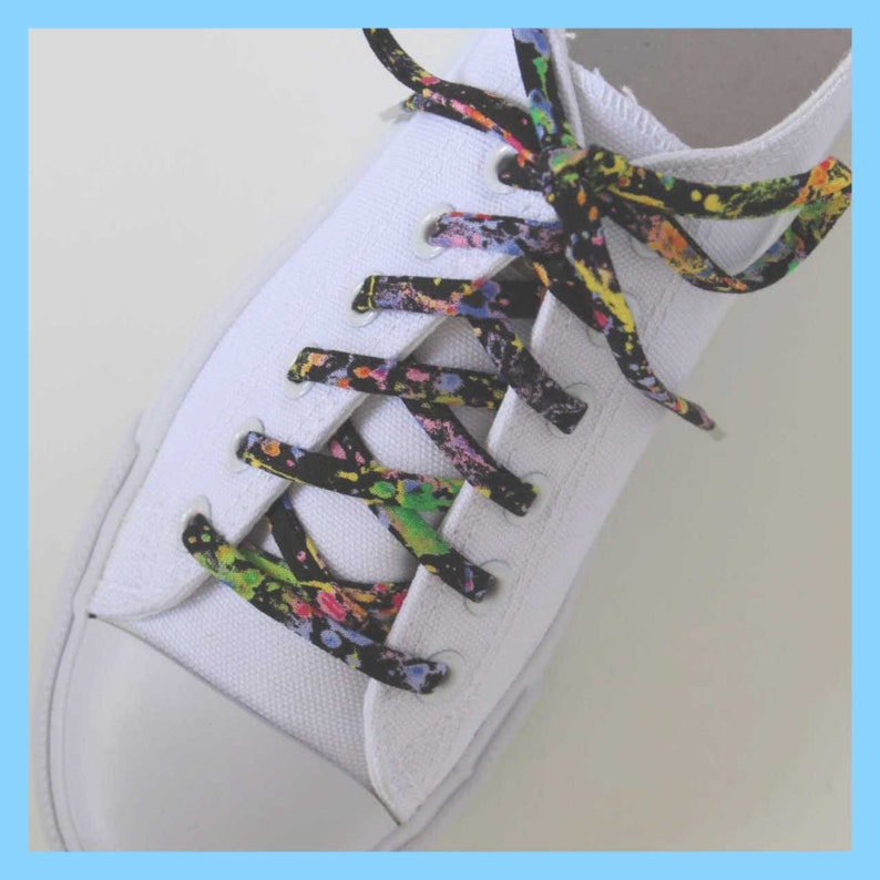 black shoelaces with silver tips