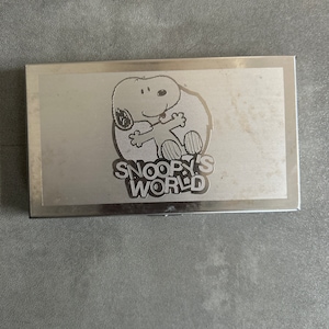 Tarjetero de Snoopy con diseño de Peanuts - Snoopy's World en oferta