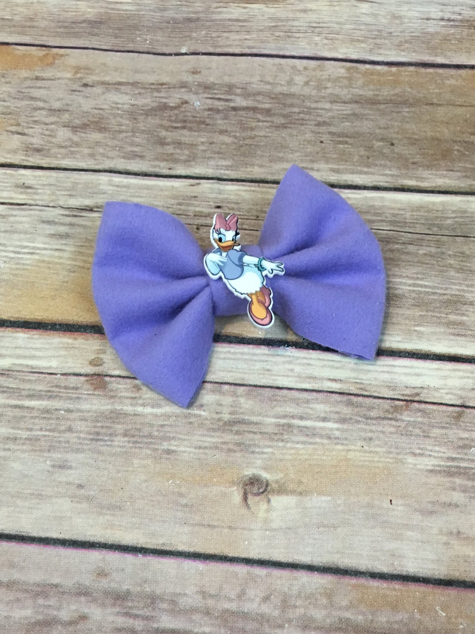 Daisy Duck bow on clip or headband Etsy
