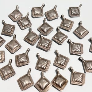 27 piece Antique silver kochi charms - tribal charms - silver charms - antique charms - Ethnic charms - Antique parts - silver parts.
