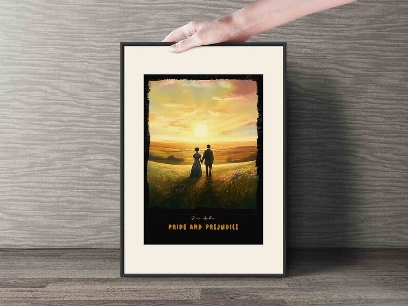May include: A framed print of a couple walking hand-in-hand in a field with a sunset in the background. The print has the text "Jane Austen Pride and Prejudice" at the bottom.