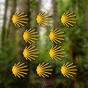 May include: Nine yellow scallop shell stickers, a symbol of the Camino de Santiago pilgrimage route.