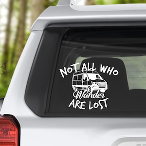 May include: White vinyl decal sticker with a white van and the text "Not All Who Wander Are Lost".