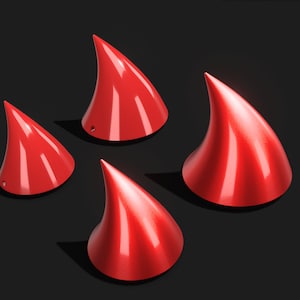 May include: Four red, glossy, pointed cones on a black background. The cones are arranged in a staggered pattern.
