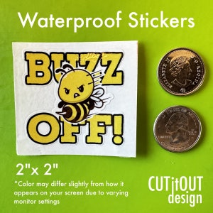 May include: A 2 inch by 2 inch waterproof sticker featuring a cartoon bee with an angry expression and the text "BUZZ OFF!" in yellow letters. The sticker is on a white background.