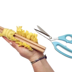 How to use a wooden gauge to cut fabric strips for proggy, shaggy and clippy rag rugs, eco-friendly crafting tool for upcycling textiles. Ragged Life cutting block.