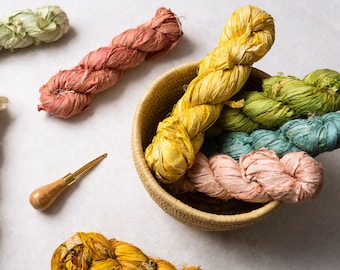 Återvunna sari-silkesbandsnästen: Textil- och fibermaterial