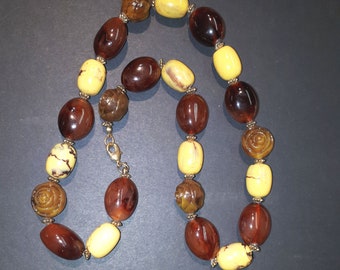 Vintage bakelite necklace - carved roses, veined cream colored and golden brown beads