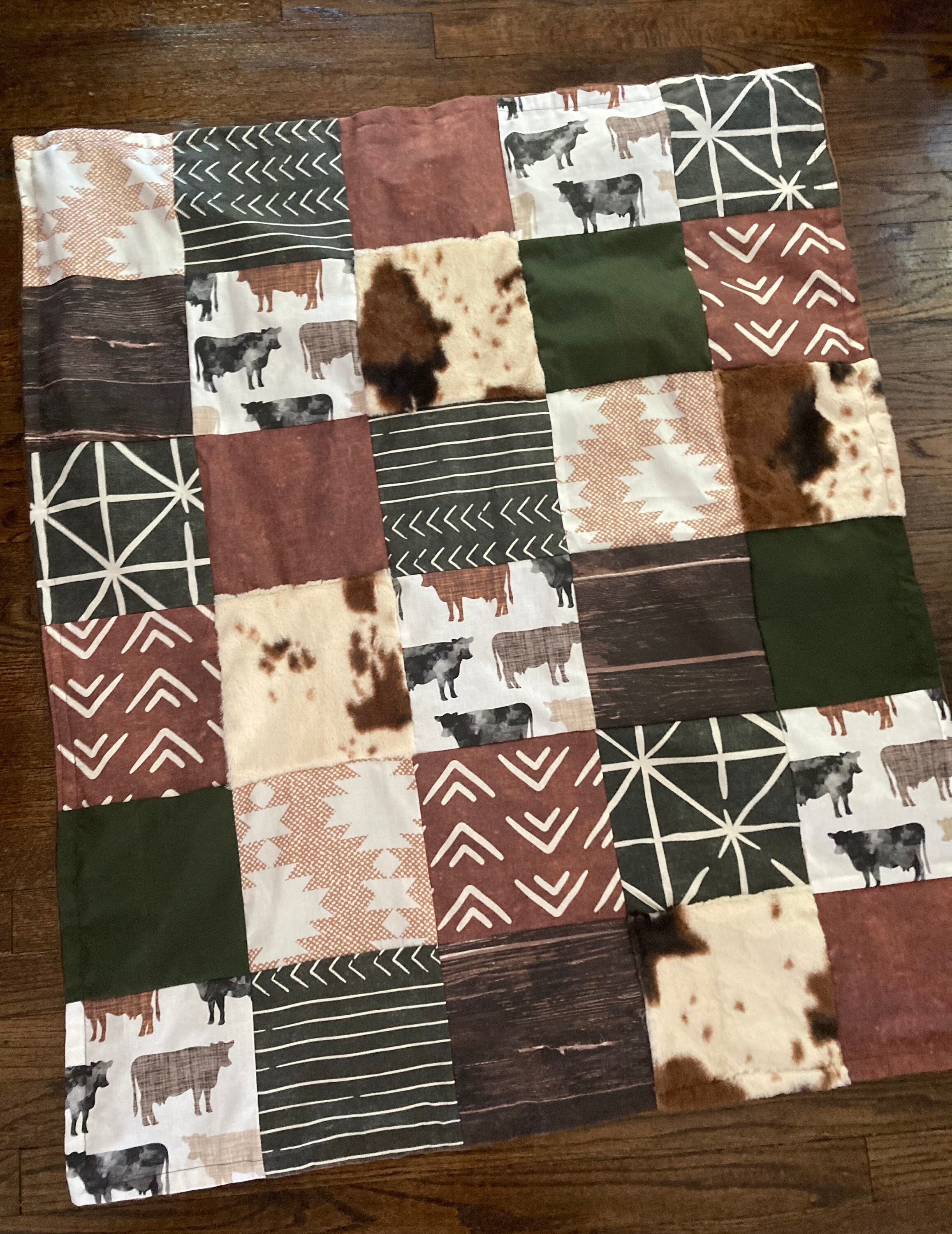 Boho Neutral Nursery in Earth Tones of Browns and Green With Boho Aztec