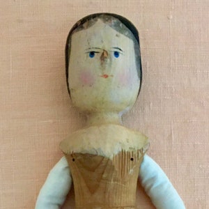 Ernest, an antique wooden gentleman