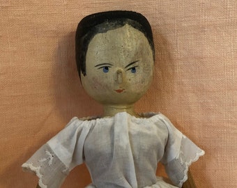 Myra, an antique wooden doll