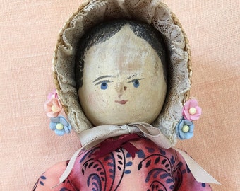 Henrietta, an antique doll in original and reproduction clothing