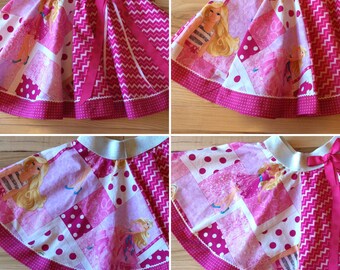 Barbie circle skirt with chevron contrast panels & polka dot bias hemline.