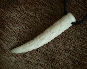 Carved horn pendant