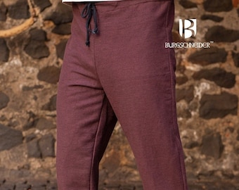 May include: BurgSchneider brand burgundy pants with a drawstring waist and slits at the ankles. The pants are made of a soft, comfortable fabric and are perfect for everyday wear.