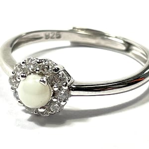 Anello minimalista in vetro all'uranio, regolabile in argento sterling 925, reattivo ai raggi UV.