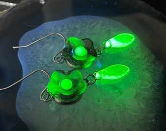 Uranium Glass Spring Flower Drop Earrings UV reactive Floral Purple and Green Easter Dangle Earrings Blacklight Fluorescent