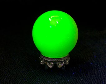 Pequeña bola de vidrio de uranio con soporte, miniatura reactiva a los rayos UV