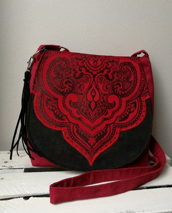 red and black messenger bolsa