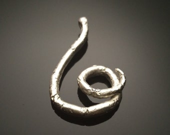 Sculpting spiral silver pendant