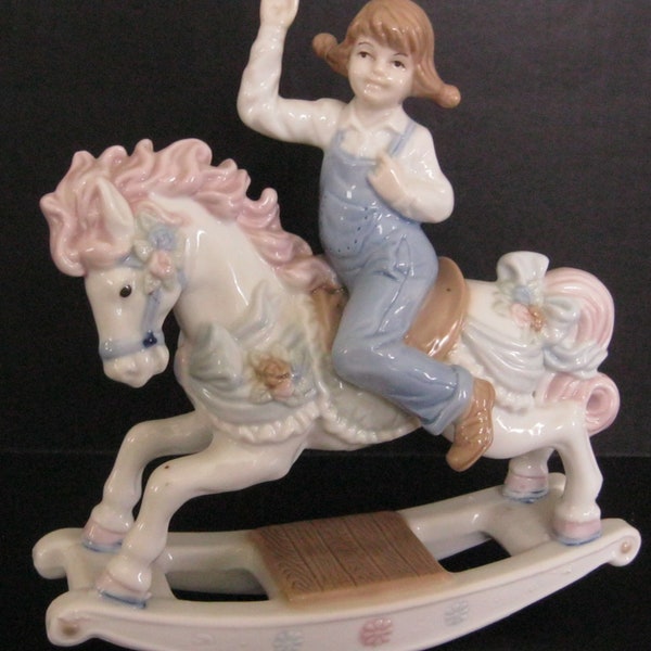 Paul Sebastian Porcelain Girl Figurine Meico Girl Riding Rocking Horse